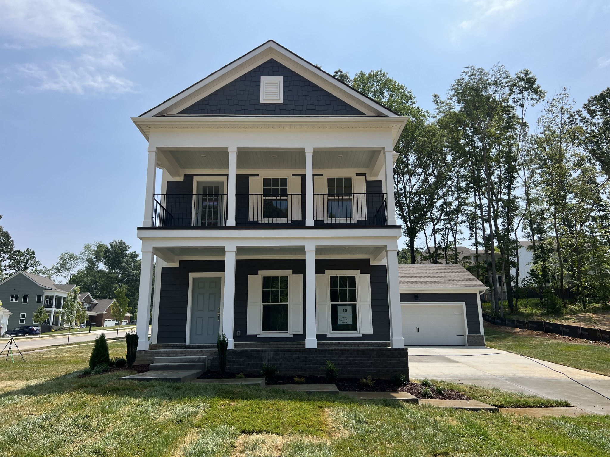 7130 Pepper Tree Circle Fairview, TN 37062 - Photo 1 of 18 front view of a house with a yard