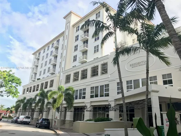 a view of a building with a street