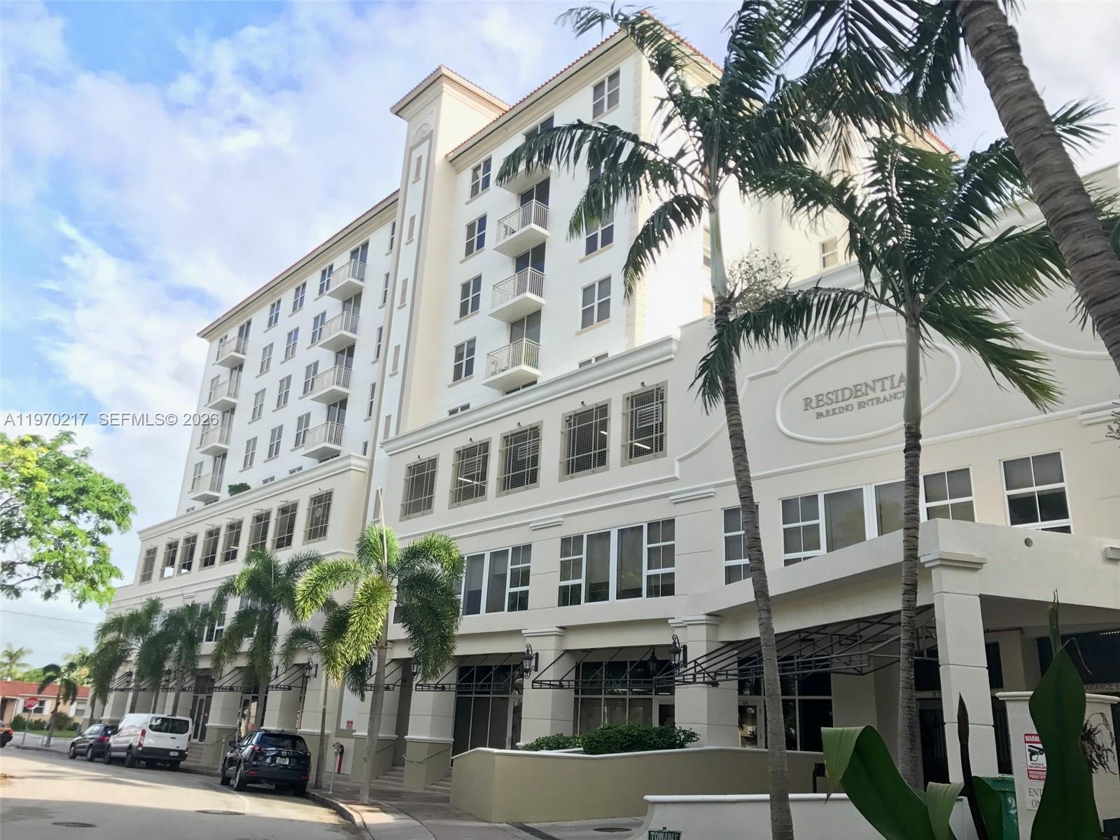 a view of a building with a street