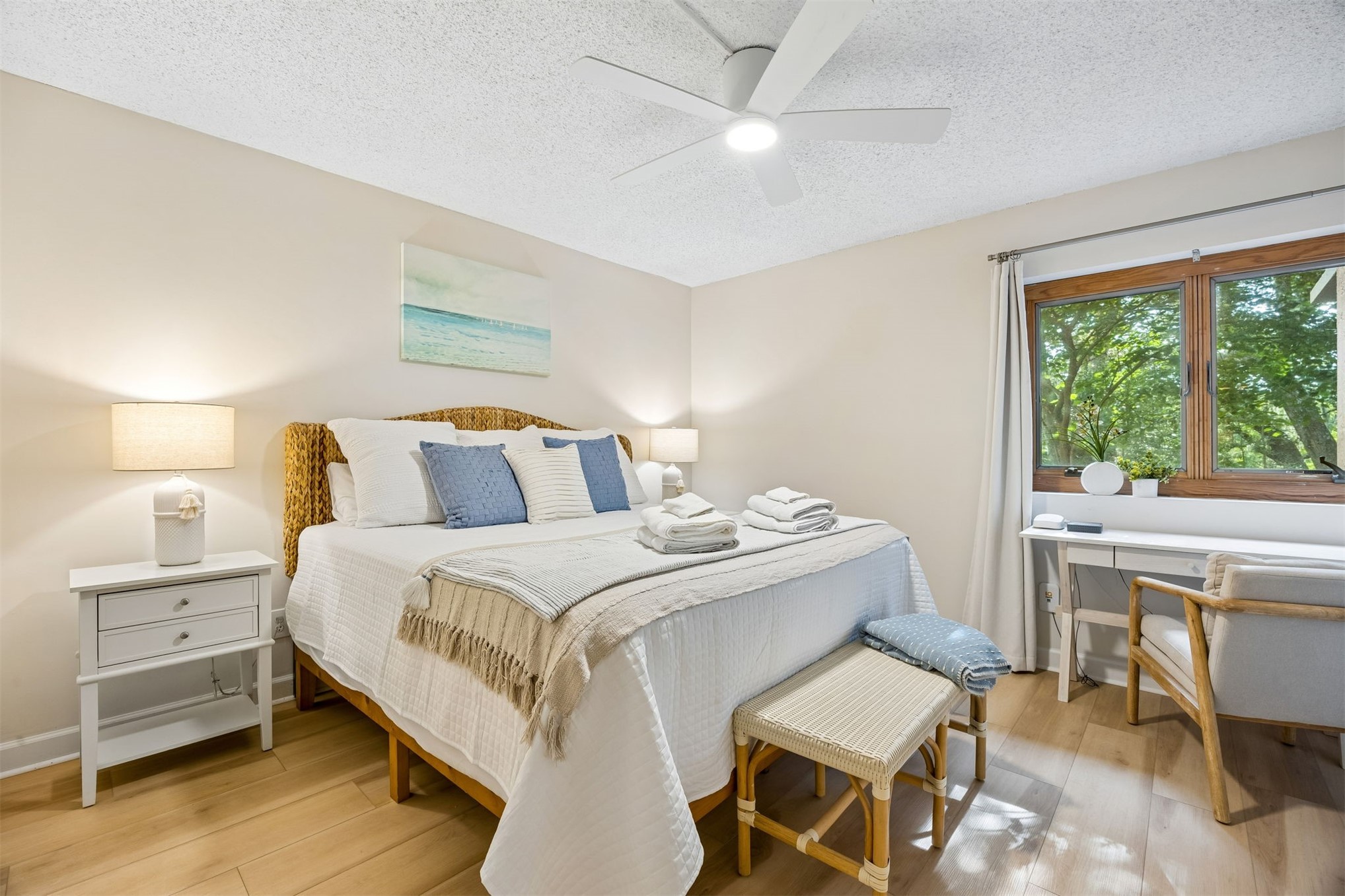 2014 Beachwood Road, Unit 2014 Amelia Island, FL 32034 - Photo 14 of 36 a bedroom with a bed and a table in it