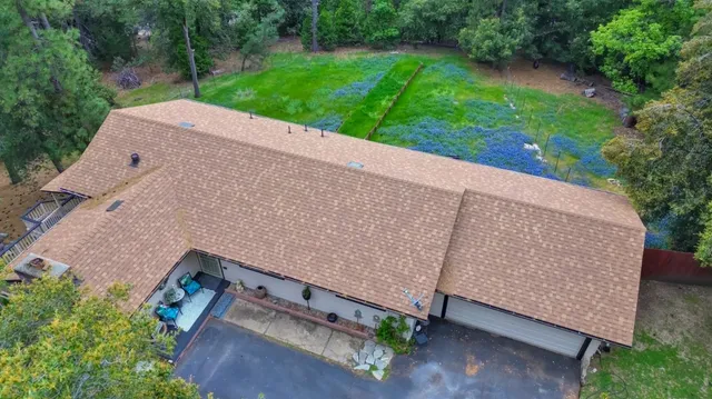 a house view with a backyard space