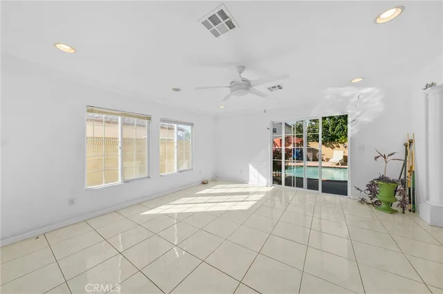 a view of an entryway with an empty room