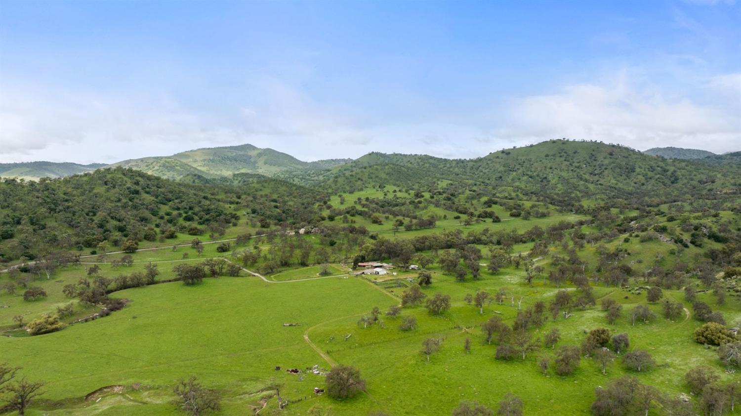 53660 Drive 152 Orosi, CA 93647 - Photo 17 of 48 a view of a lake with a mountain in the background