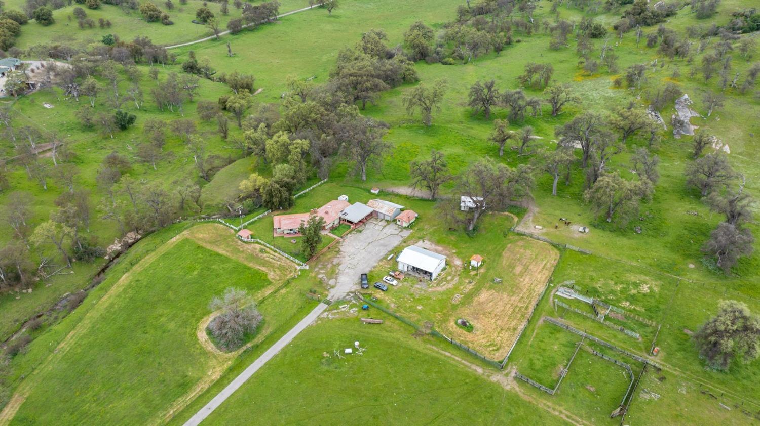 53660 Drive 152 Orosi, CA 93647 - Photo 20 of 48 an aerial view of a residential houses with outdoor space