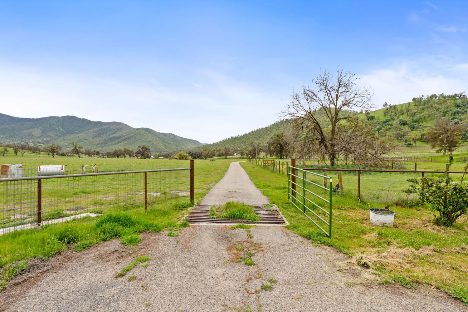 53660 Drive 152 Orosi, CA 93647 - Photo 24 of 48 a view of lake with houses in the background