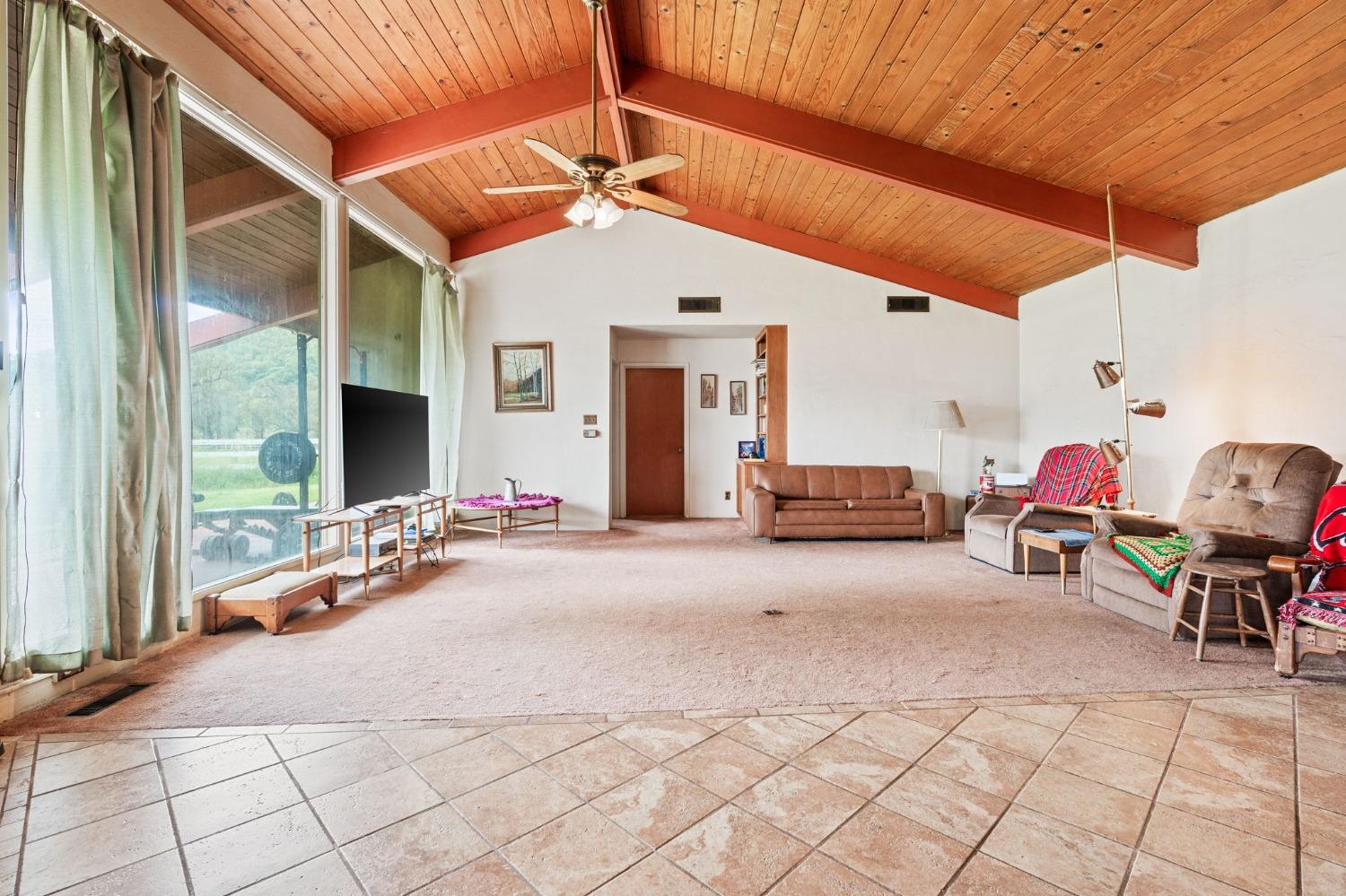 53660 Drive 152 Orosi, CA 93647 - Photo 28 of 48 a view of a patio with table and chairs under an umbrella