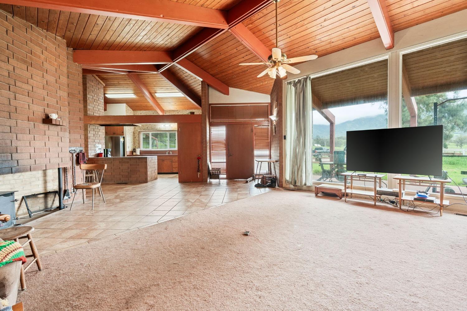 53660 Drive 152 Orosi, CA 93647 - Photo 29 of 48 a view of a livingroom with furniture and a flat screen tv
