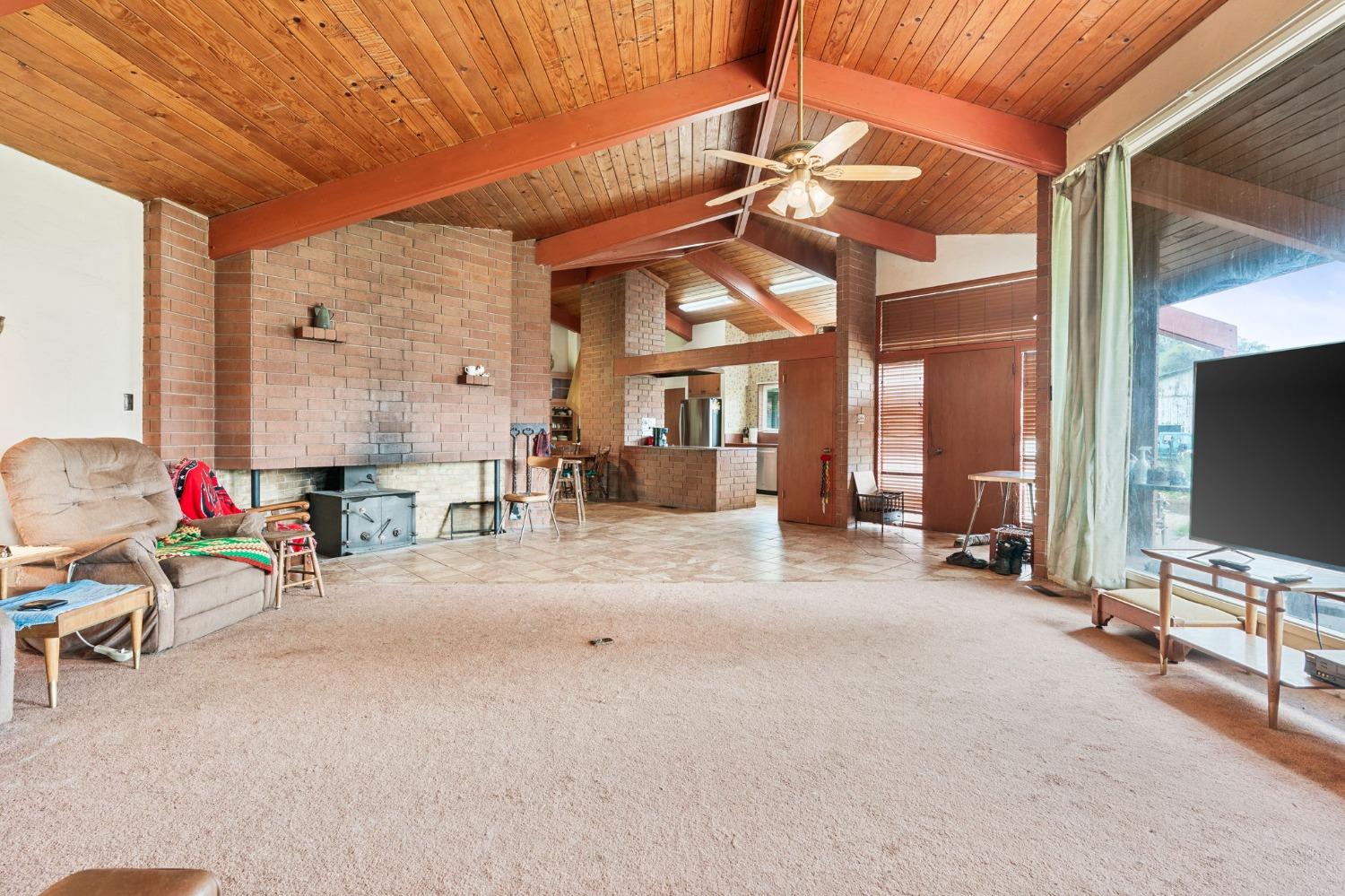 53660 Drive 152 Orosi, CA 93647 - Photo 30 of 48 a view of a livingroom with furniture and a flat screen tv