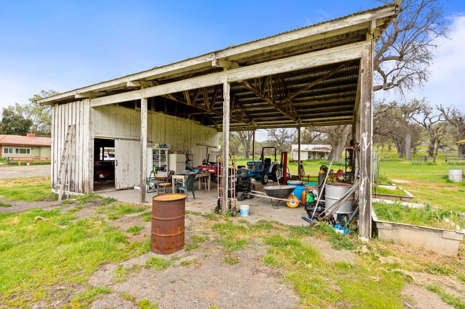 53660 Drive 152 Orosi, CA 93647 - Photo 40 of 48 a view of a chairs and table in a patio