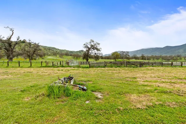 a view of a golf course with a lake view