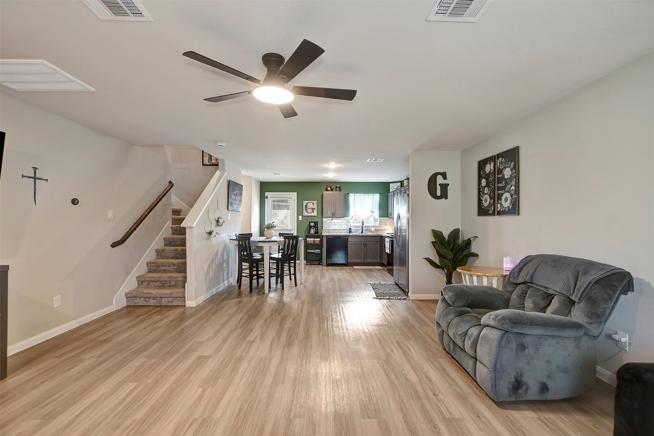 950 21st Street Hempstead, TX 77445 - Photo 16 of 35 View from living room with stairs leading to your loft and 3 bedrooms!