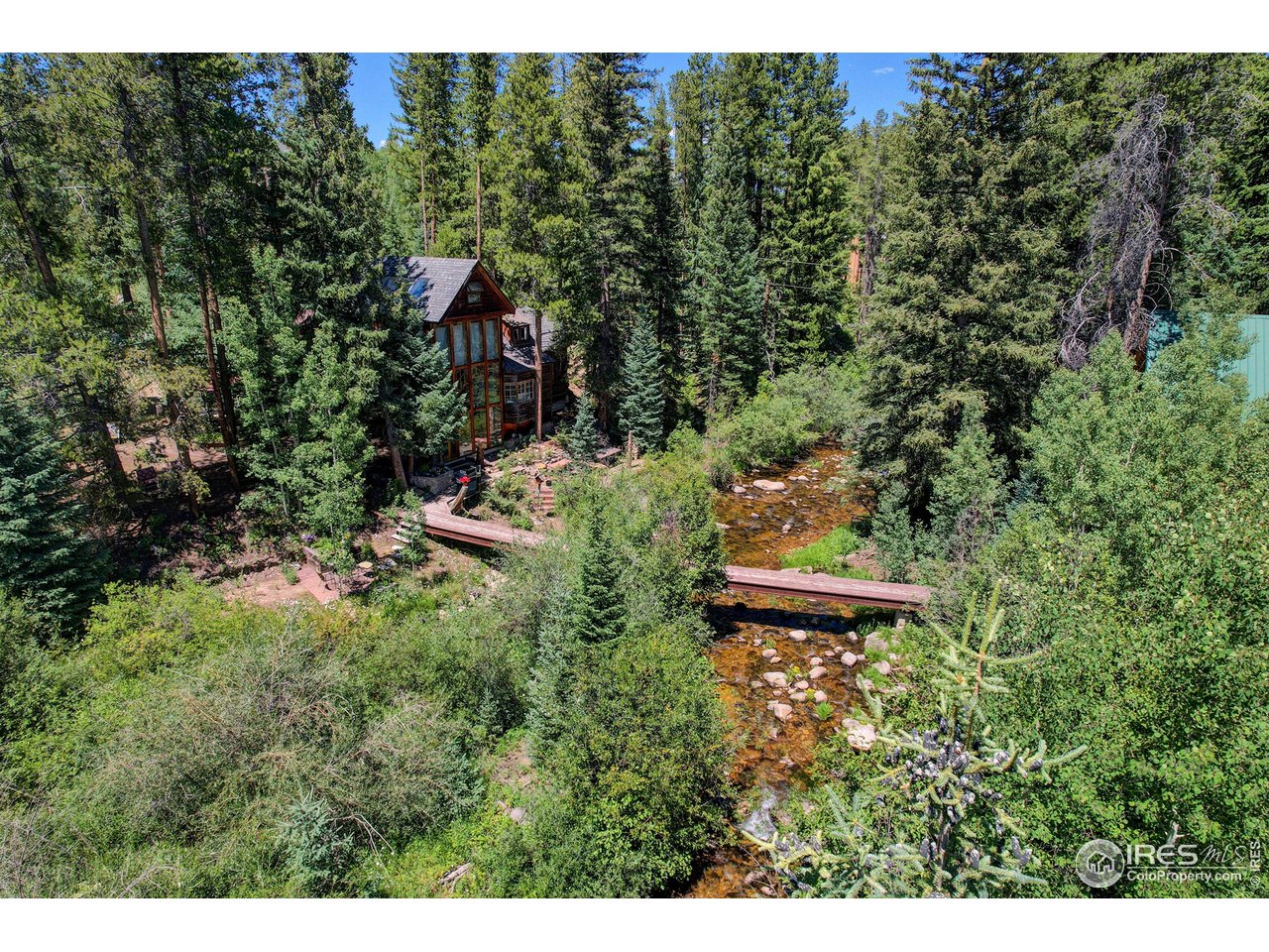 185 Vasquez Road, Unit C4 Winter Park, CO 80482 - Photo 5 of 23 a aerial view of a house with a yard