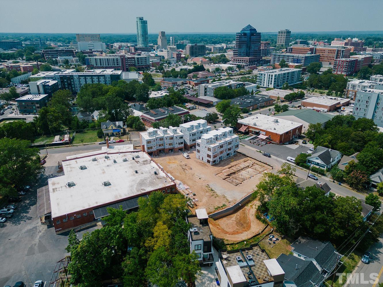 3007 Corbell Road Durham, NC 27701 - Photo 3 of 30 an aerial view of a house with a yard basket ball court and outdoor seating