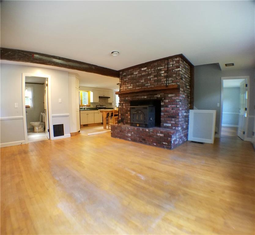 65 Bear Hill Road Hollis, ME 04042 - Photo 11 of 21 Living room with a wood burning firplace