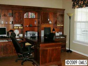 328 Brixham Place Fort Mill, SC 29708 - Photo 4 of 8 a view of a workspace with furniture and a window