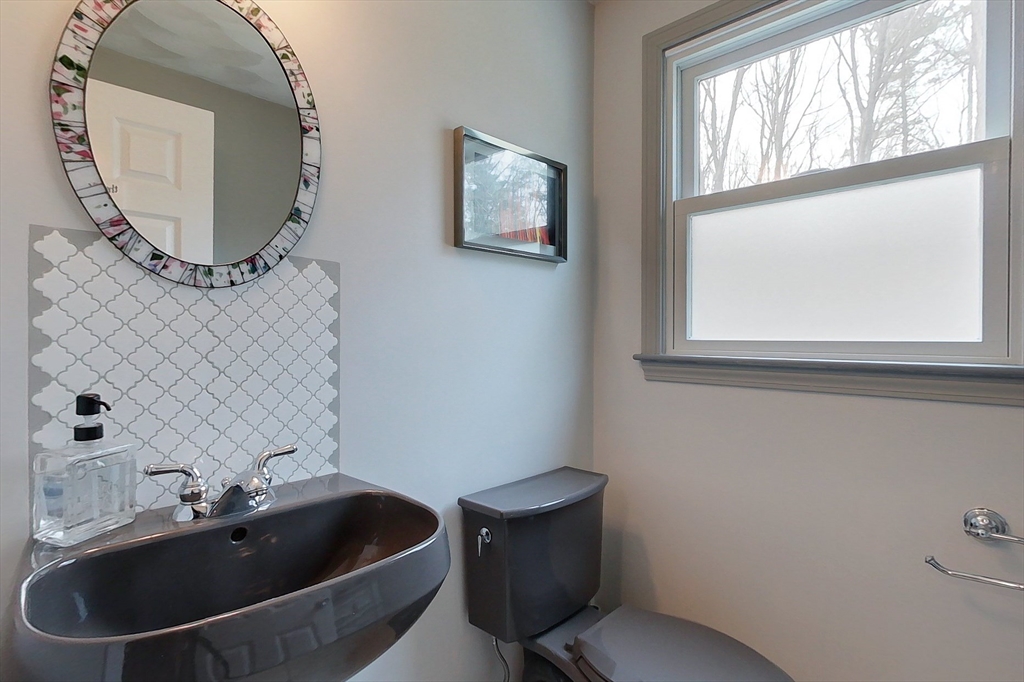 4 Wilderness Way Pepperell, MA 01463 - Photo 17 of 42 a bathroom with a toilet and a sink