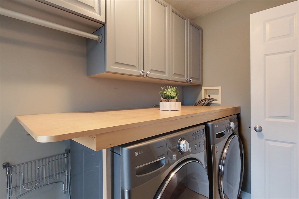 4 Wilderness Way Pepperell, MA 01463 - Photo 18 of 42 a utility room with dryer and washer