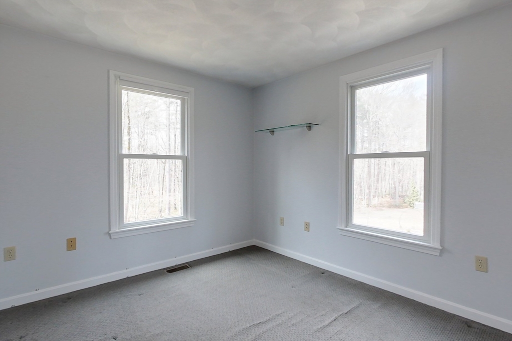 4 Wilderness Way Pepperell, MA 01463 - Photo 24 of 42 an empty room with a window