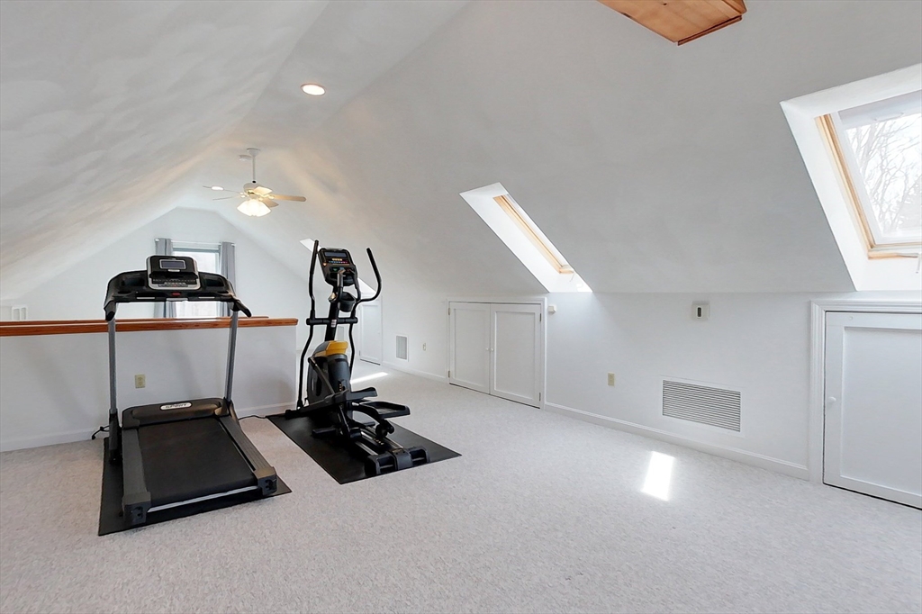 4 Wilderness Way Pepperell, MA 01463 - Photo 26 of 42 a room with gym equipment and a window