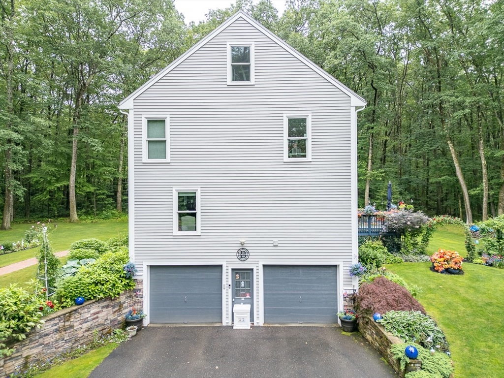4 Wilderness Way Pepperell, MA 01463 - Photo 28 of 42 a front view of house with yard
