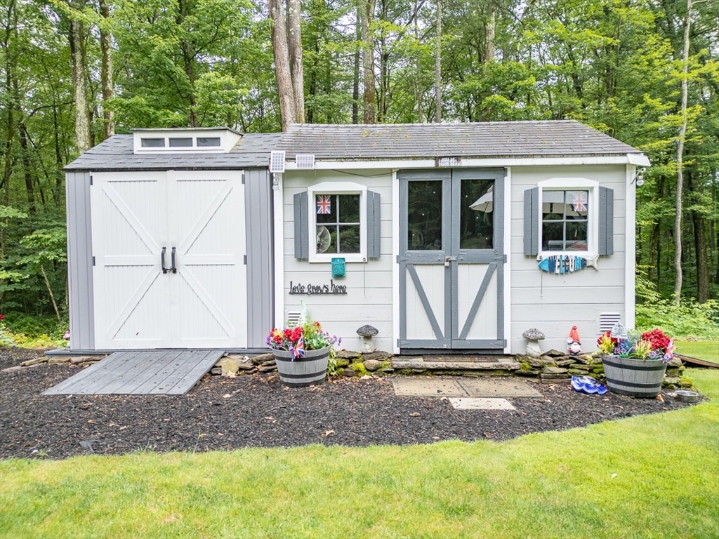 4 Wilderness Way Pepperell, MA 01463 - Photo 31 of 42 a view of front of house with a yard