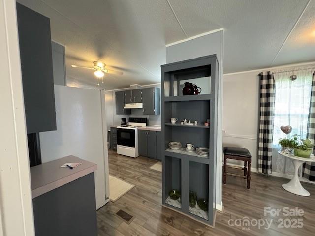 1761 Finch Farm Road, Unit 4 Trinity, NC 27370 - Photo 11 of 37 a kitchen with stainless steel appliances a refrigerator and a stove top oven