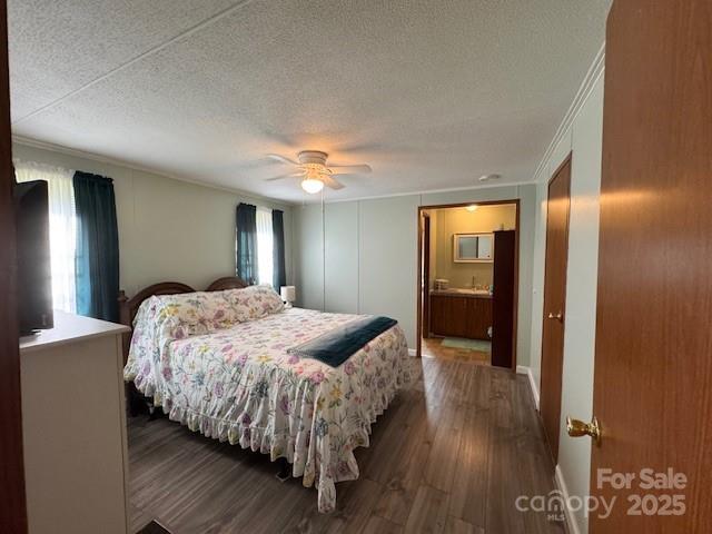 1761 Finch Farm Road, Unit 4 Trinity, NC 27370 - Photo 15 of 37 a bedroom with a bed and wooden floor