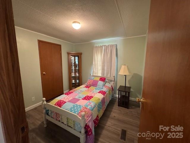 1761 Finch Farm Road, Unit 4 Trinity, NC 27370 - Photo 17 of 37 a bedroom with a bed and a dresser