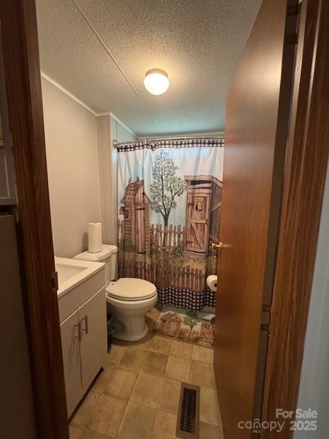 1761 Finch Farm Road, Unit 4 Trinity, NC 27370 - Photo 18 of 37 a bathroom with a toilet a sink and shower