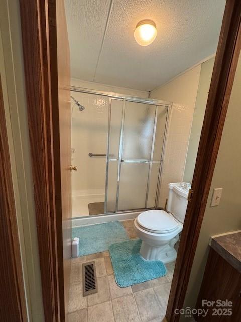 1761 Finch Farm Road, Unit 4 Trinity, NC 27370 - Photo 19 of 37 a bathroom with a toilet and a shower