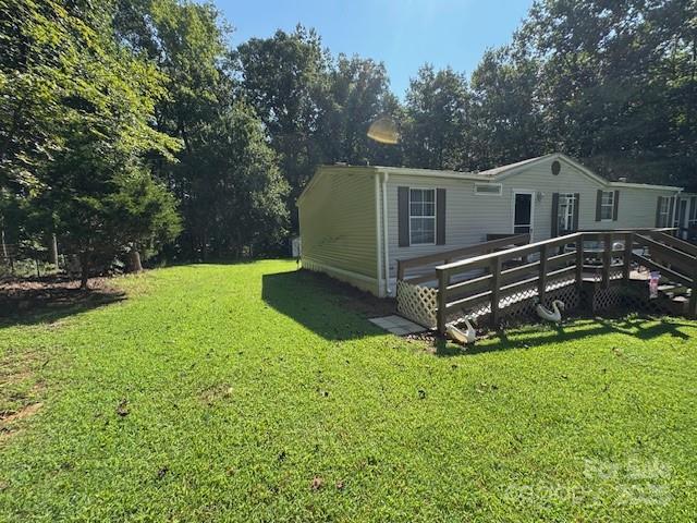 1761 Finch Farm Road, Unit 4 Trinity, NC 27370 - Photo 2 of 37 a view of a house with a yard