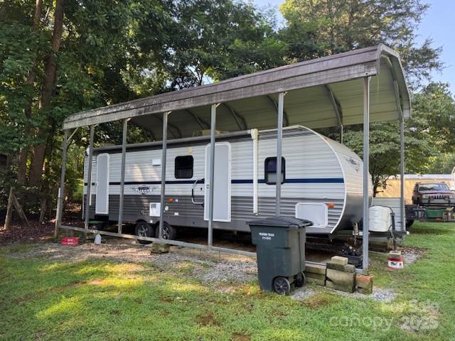 1761 Finch Farm Road, Unit 4 Trinity, NC 27370 - Photo 22 of 37 a view of house with backyard porch and sitting area