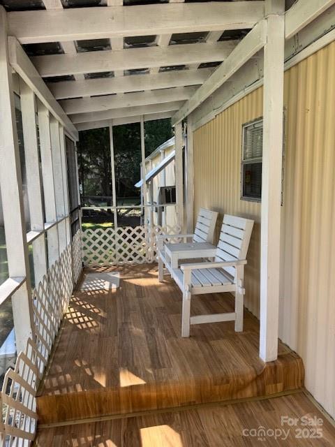 1761 Finch Farm Road, Unit 4 Trinity, NC 27370 - Photo 24 of 37 a backyard of a house with wooden floor and outdoor seating