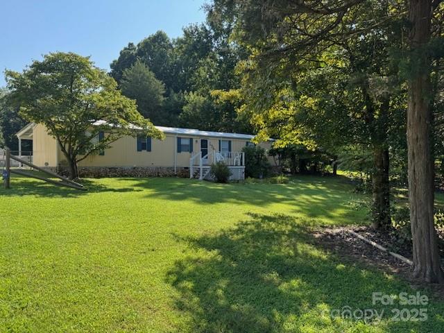 1761 Finch Farm Road, Unit 4 Trinity, NC 27370 - Photo 26 of 37 a house view with a garden space