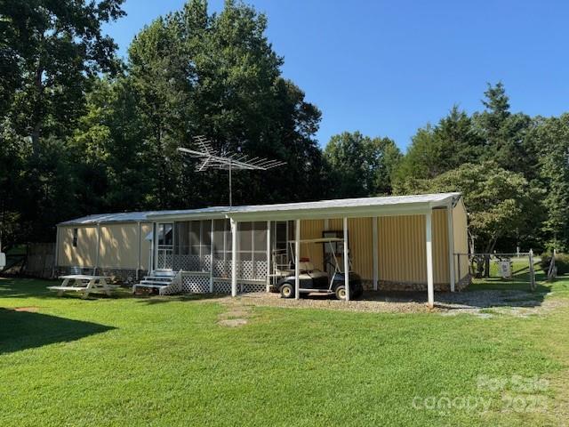 1761 Finch Farm Road, Unit 4 Trinity, NC 27370 - Photo 27 of 37 a front view of house with yard having outdoor seating