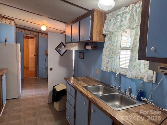 1761 Finch Farm Road, Unit 4 Trinity, NC 27370 - Photo 35 of 37 a kitchen with stainless steel appliances granite countertop a sink stove and refrigerator