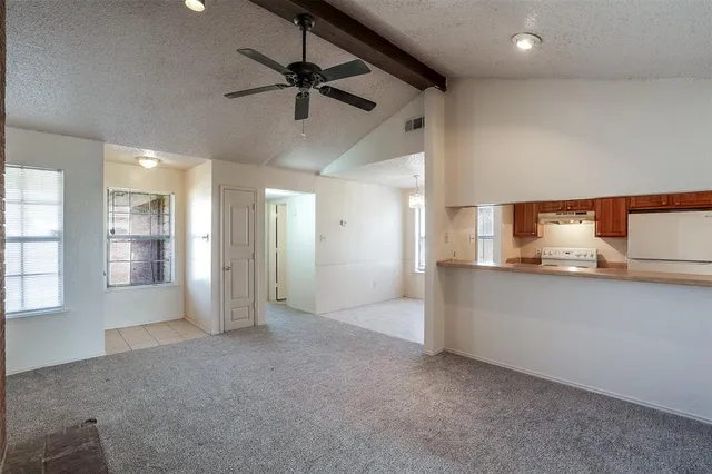 a view of a kitchen with a sink and cabinet area