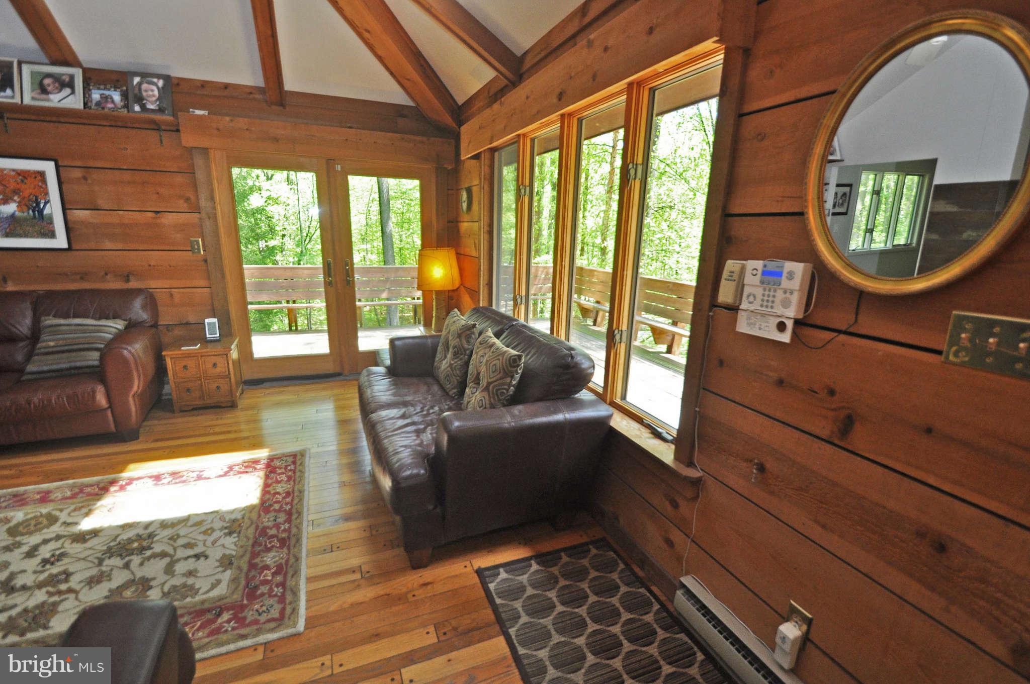 4701 Teen Barnes Road Frederick, MD 21703 - Photo 4 of 30 A comfortable, welcoming room w/ cedar siding