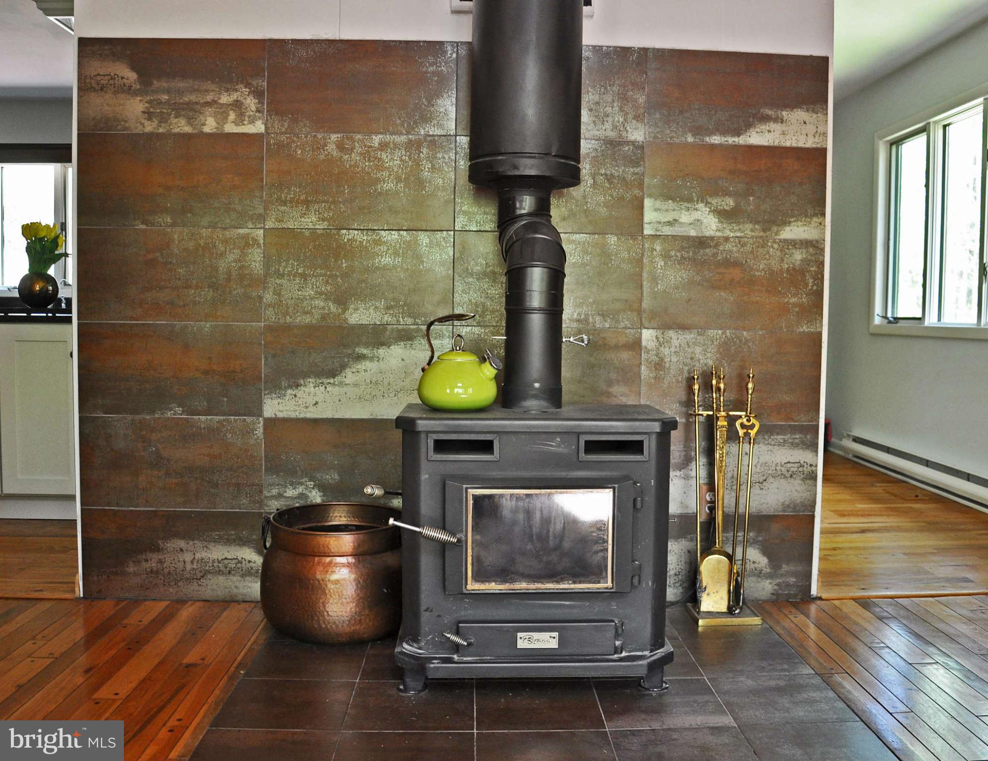 4701 Teen Barnes Road Frederick, MD 21703 - Photo 6 of 30 Woodstove with attractive tiled wall