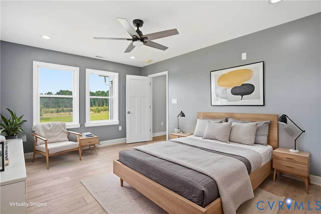 7839 King William Road Aylett, VA 23009 - Photo 16 of 38 a bedroom with a bed and glass window