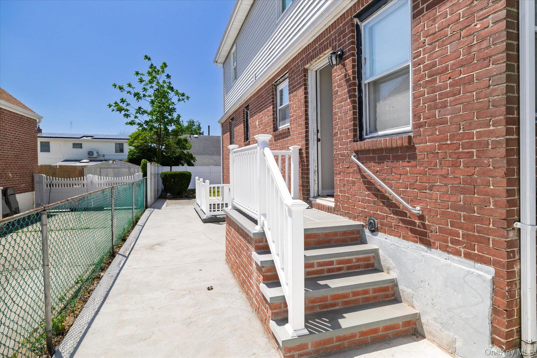 191 Raff Avenue Mineola, NY 11501 - Photo 4 of 25 a view of a potted plants with sky view