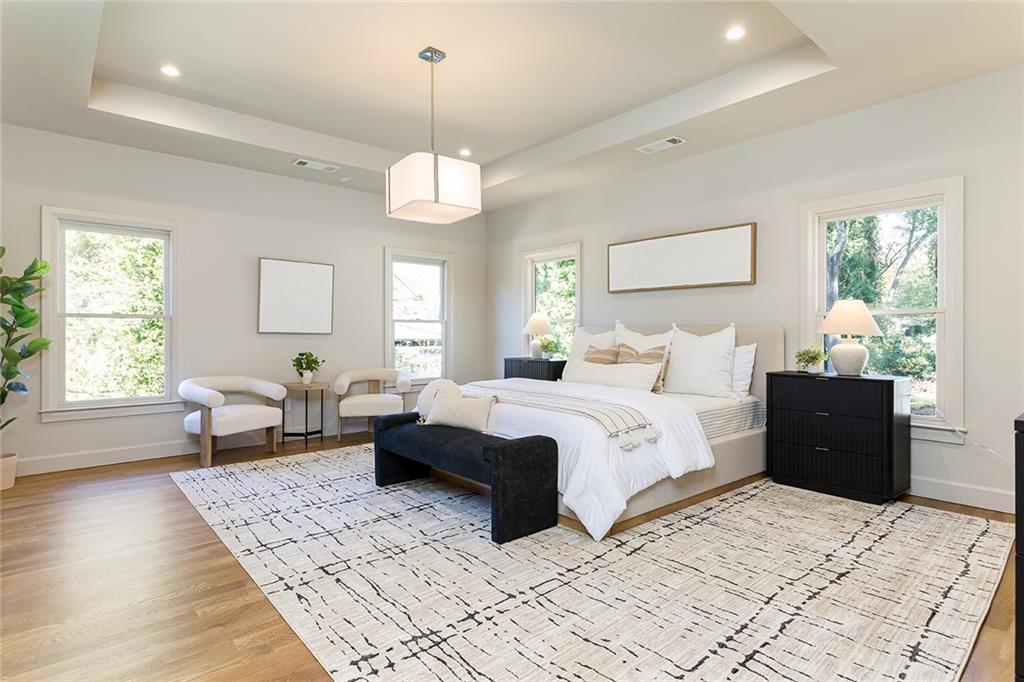 3156 Zion Street Scottdale, GA 30079 - Photo 22 of 48 a bedroom with bed and wooden floor