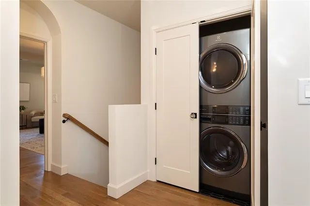 a view of a hallway with washer and dryer