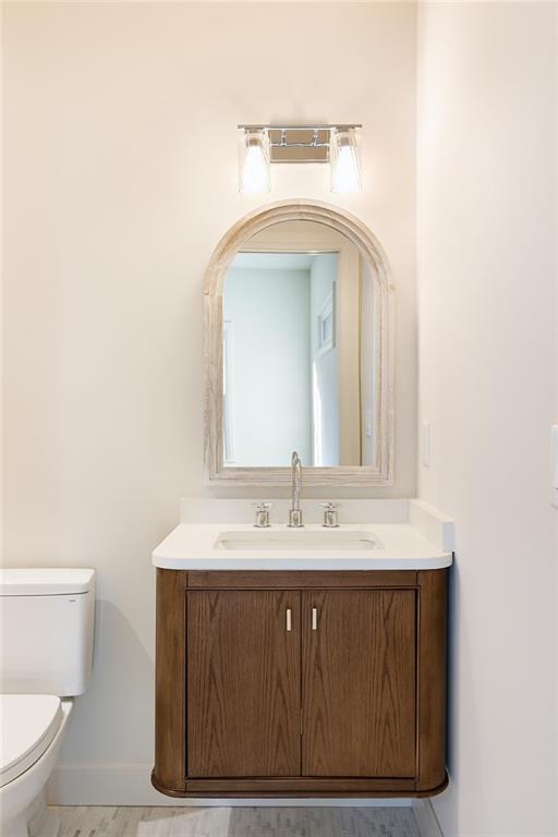 3156 Zion Street Scottdale, GA 30079 - Photo 29 of 48 a bathroom with a sink a toilet and mirror