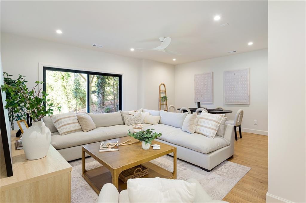3156 Zion Street Scottdale, GA 30079 - Photo 35 of 48 a living room with furniture and a large window