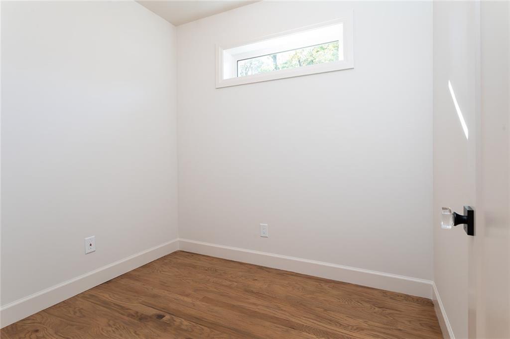 3156 Zion Street Scottdale, GA 30079 - Photo 38 of 48 a view of a small space with wooden floor and a window