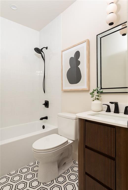 3156 Zion Street Scottdale, GA 30079 - Photo 40 of 48 a bathroom with a toilet sink a mirror and shower