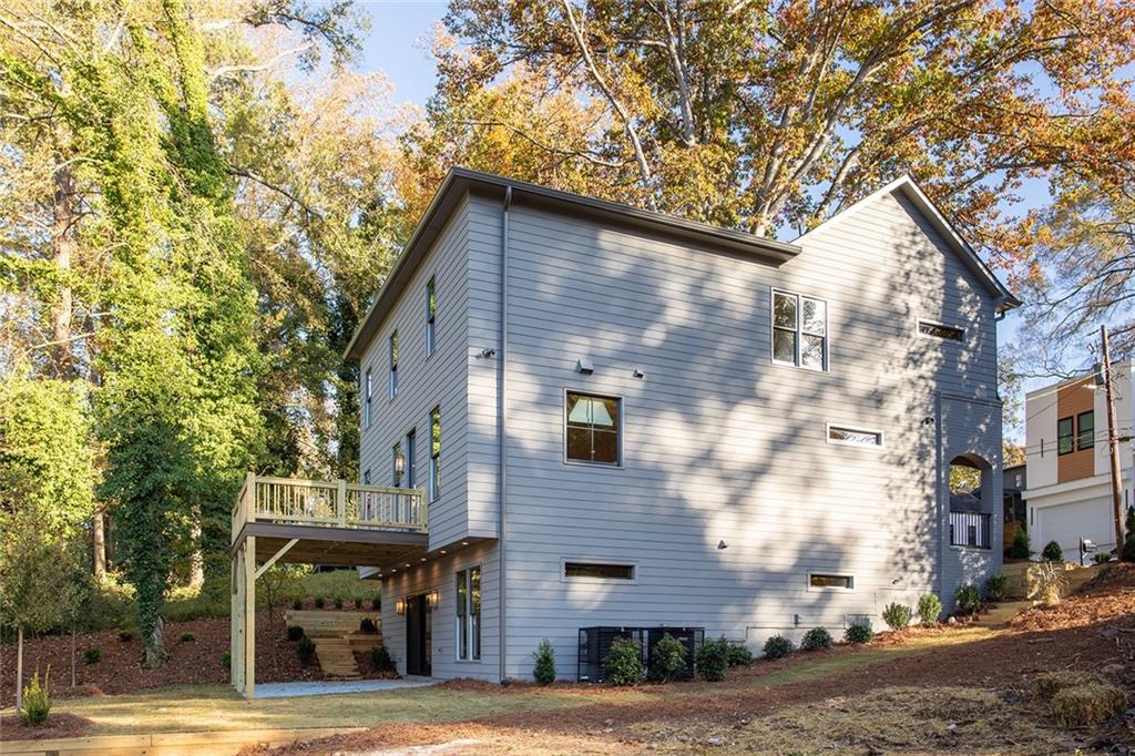 3156 Zion Street Scottdale, GA 30079 - Photo 4 of 48 a front view of a house with a garden