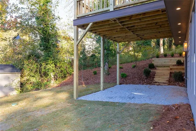 a view of a backyard with a patio