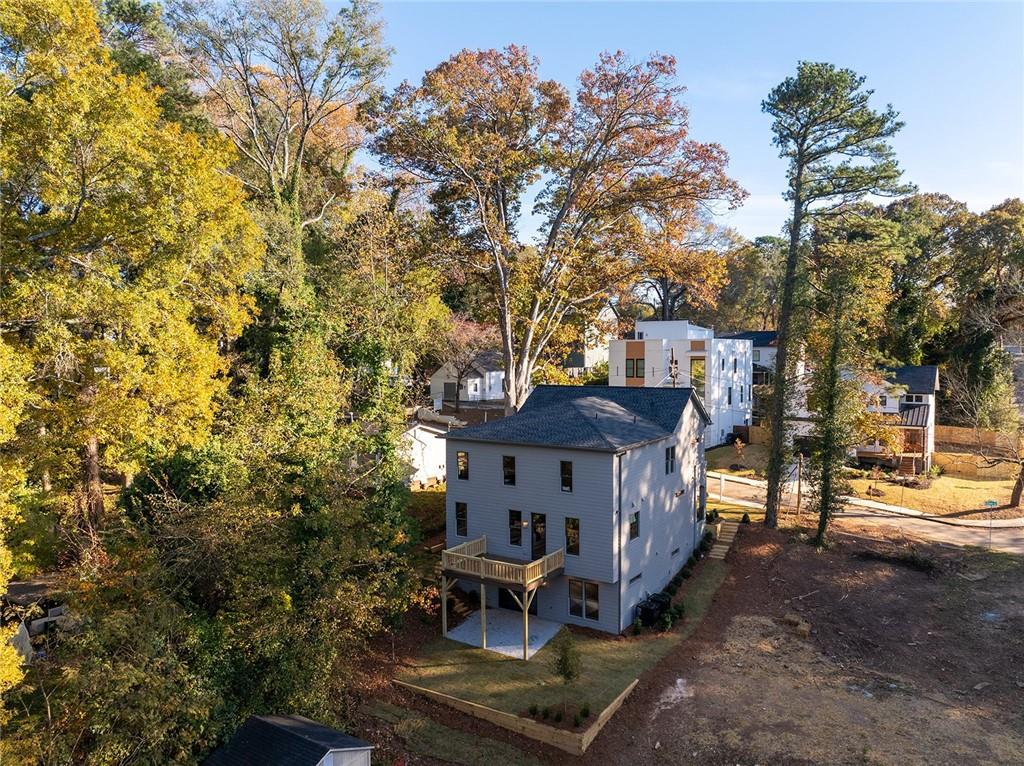 3156 Zion Street Scottdale, GA 30079 - Photo 46 of 48 a front view of a house with garden